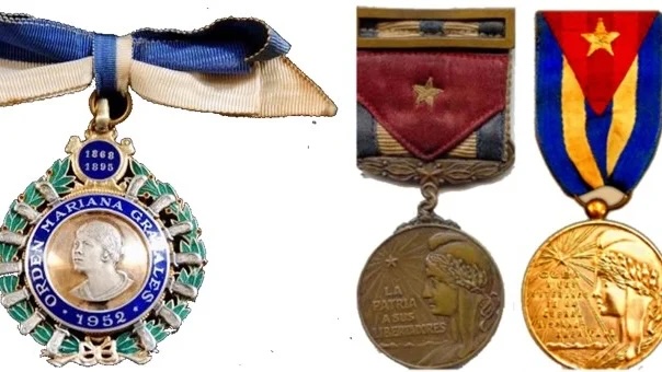 Orden Mariana Grajales, medallas de la Independencia y de los veteranos de la guerra de 1898, respectivamente.