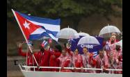 La delegación cubana, con sus banderados Idalys Ortiz y Julio César la  Cruz.