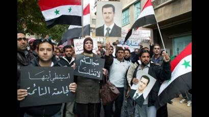 Sirios rechazan la suspensión de su país