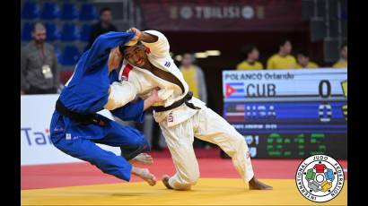 Orlando Polanco ante el estadounidense Ari Berliner, bronce ahora en Panamá.