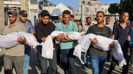 Trasladan cuerpos de tres niños muertos
